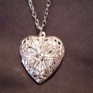 Special photo heart charm and chain.  All silver toned.  Perfect gift for Mom.